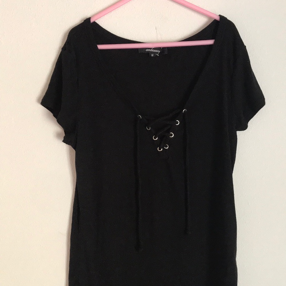 Papaya black top with shoe lace tie in front.